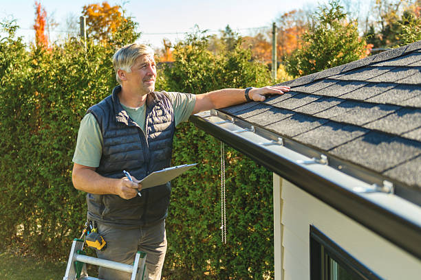 Professional Hail Damage Roof Repair technician working in Eagle Point, AL